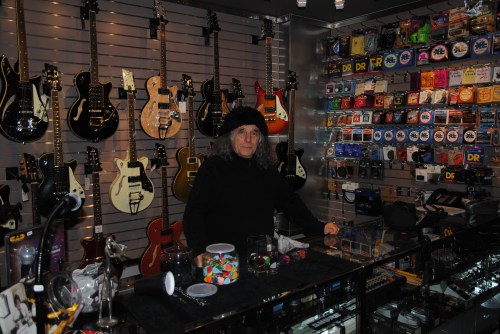 Nick Angelo and his prized Dusenberg guitars